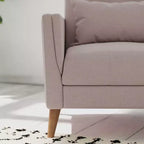 Poltrona imbottita Mid-Century Modern con sedile e schienale trapuntati, supporto con molle insacchettate e gambe in legno