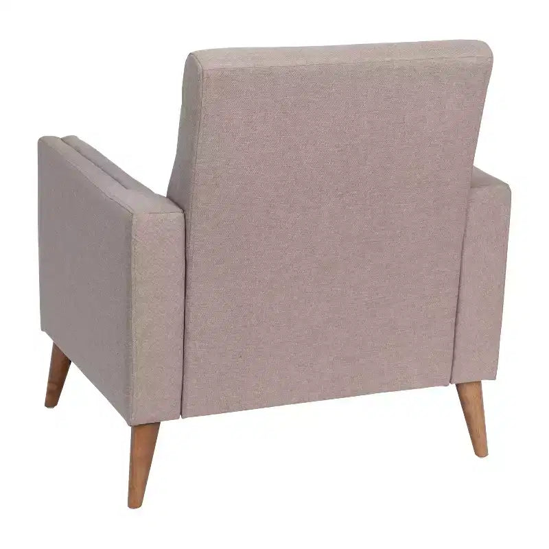 Poltrona imbottita Mid-Century Modern con sedile e schienale trapuntati, supporto con molle insacchettate e gambe in legno